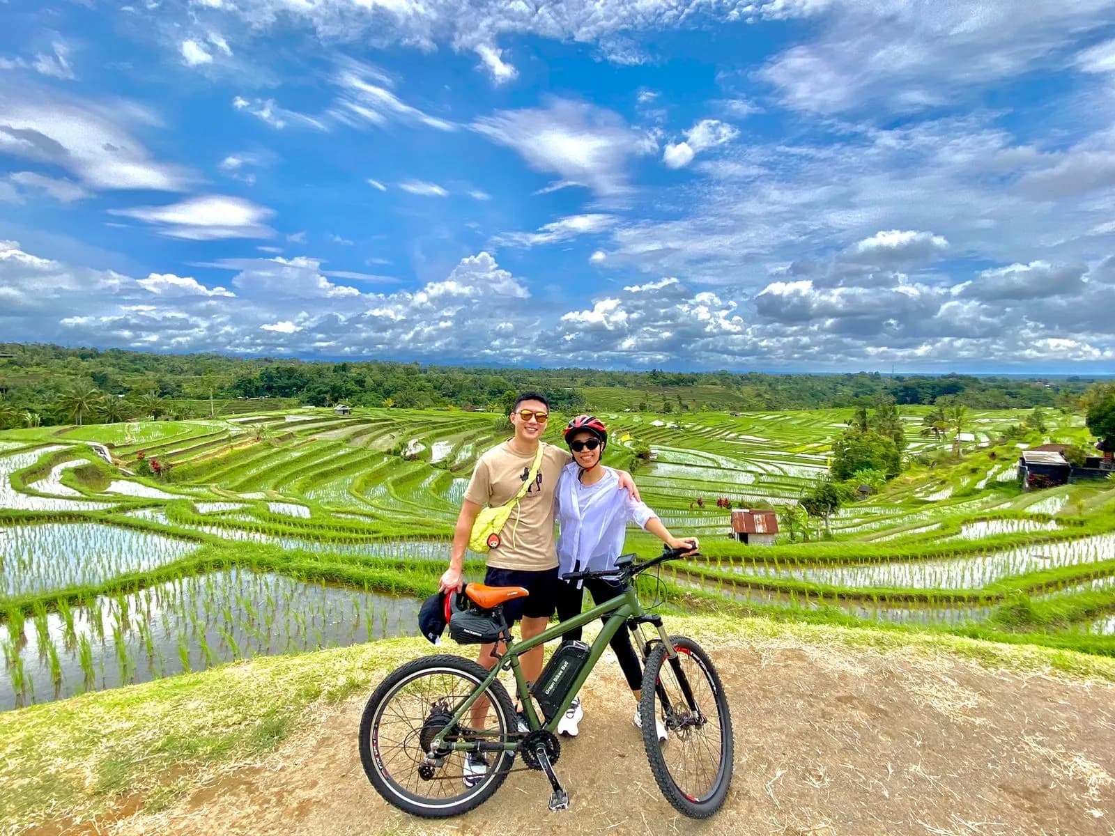 Cyclists riding through the Jatiluwih rice terraces in Bali